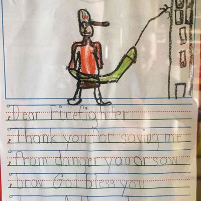 Благодарственное письмо пожарному. На рисунке он за работой